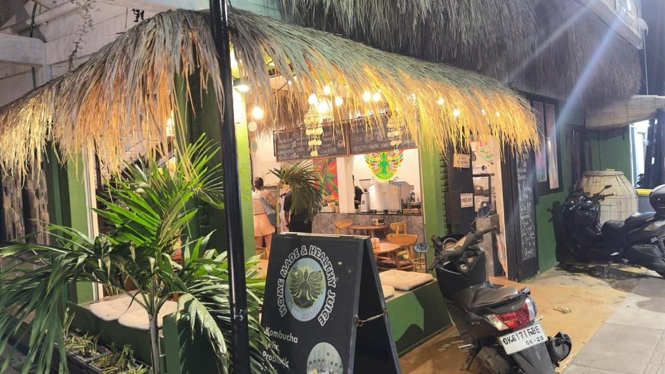 Night entrance exterior of Slavic Roots Cafe & Eatery in Berawa, Canggu, Bali